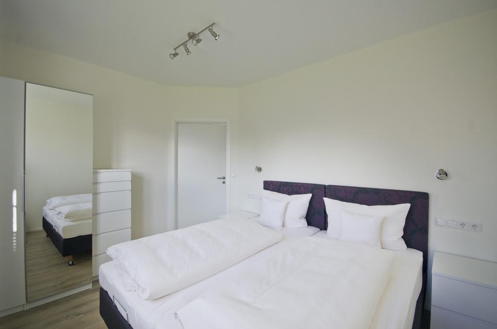 Appartements Am Kurpark Bad Windsheim Quarto foto